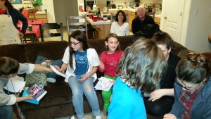 Kids opening their presents.