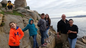 Before we went into the aquarium we went to the beach.  We saw hermit crabs and otters.  The otters had just caught breakfast and enjoyed parading around with it.  