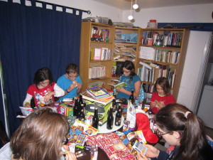 Opening stockings and eating breakfast.