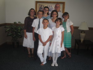 Our Family is growing up.  Jaime's baptism photo showed lots of little cherubs.  Now all my angles are growed up.